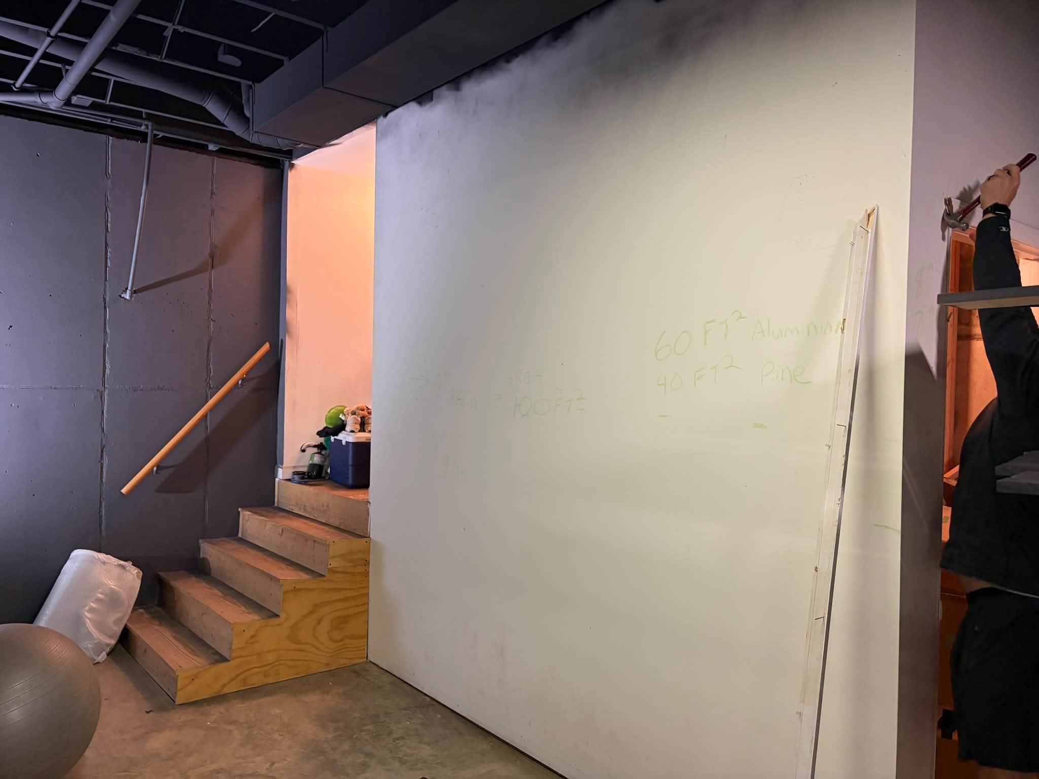 Before: blank basement wall