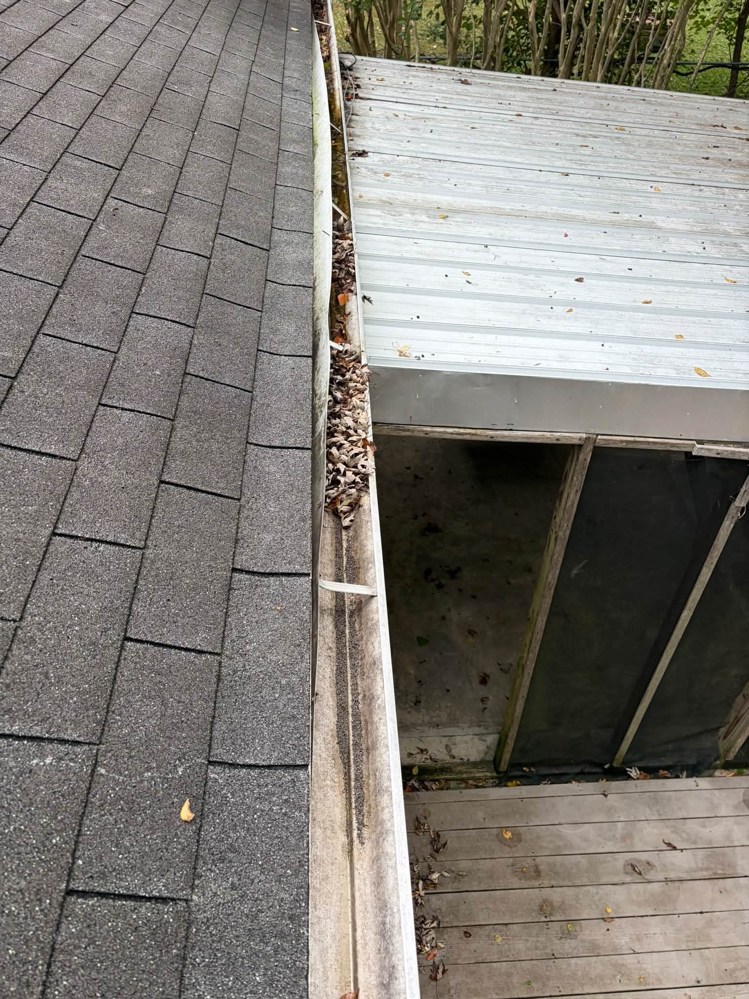 Gutter packed with dead leaves